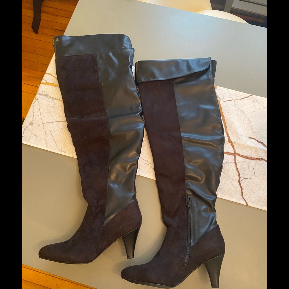 Over the knee black boots. Faux leather and fabric. Size 9.5M. Never worn.